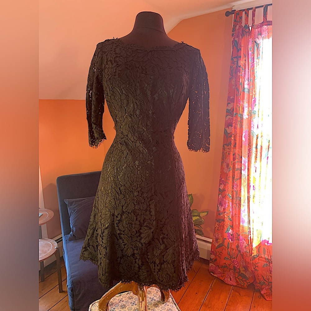 Size 10, lace overlay, knee length black dress.